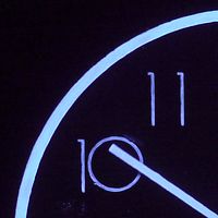 
backwards running wall clock, fluorescent pigment, UV light
